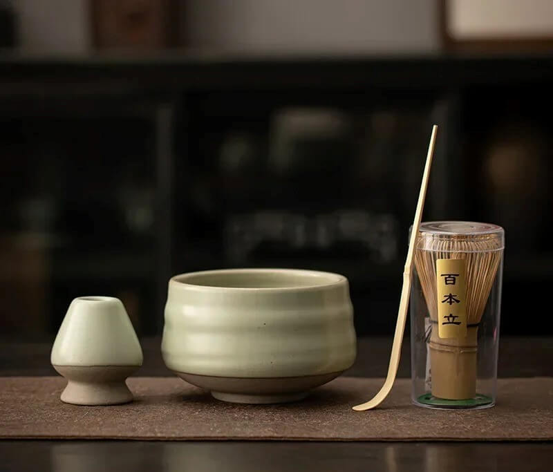 4 piece green gloss ceramic matcha tea set with bowl, whisk holder, bamboo whisk and bamboo tea scoop