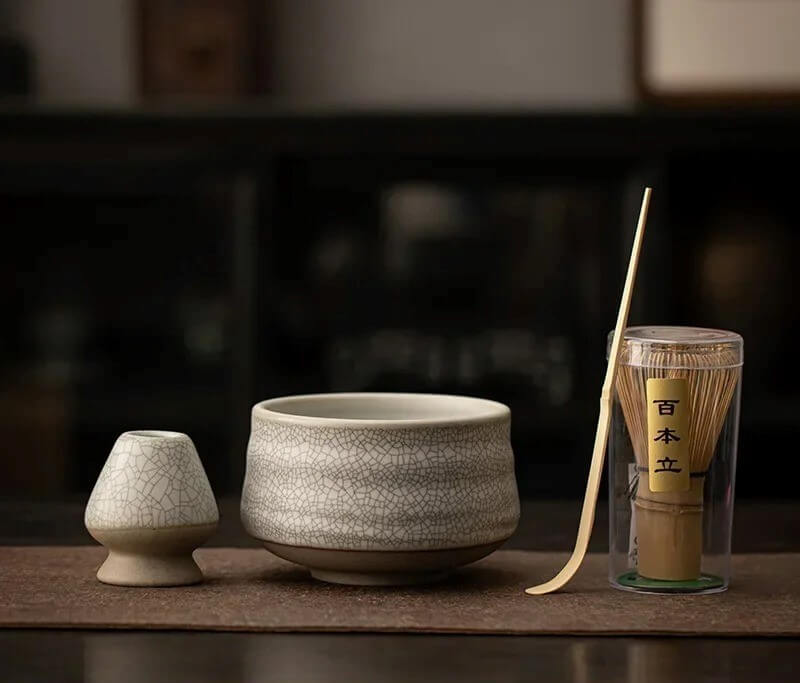 4 piece grey crackled ceramic matcha tea set with bowl, whisk holder, bamboo whisk and bamboo tea scoop